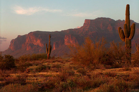 The sun sets on the Flat Iron in the Superstition Mountains